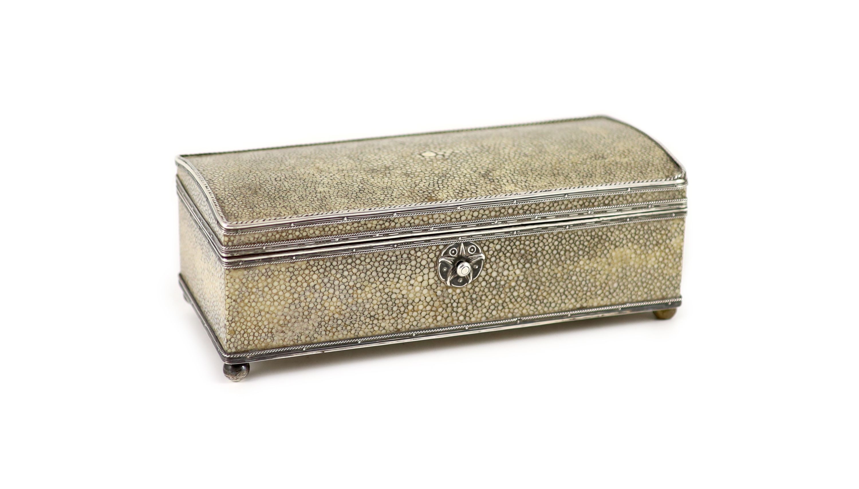 An Arts and Crafts silver mounted shagreen rectangular cigarette box, by John Paul Cooper